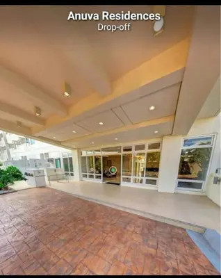 a empty lobby of a shopping center with a large building at Staycation One bedroom in Manila