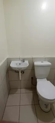 a bathroom with a toilet and a sink at URBAN DECA R1125 Ortigas SM EAST in Manila