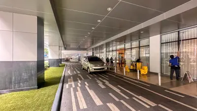 a car parked inside of a building with a car parked in it at Oasis Urban Stay 2 in Manila