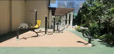 a row of exercise equipment in front of a building at 2BR at the FORT BGC near Malls, Restaurants & Shops in Manila