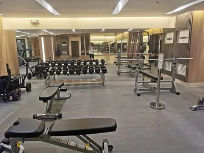 a gym with rows of chairs and machines at Mao shore 3 residence tower 2 in Manila