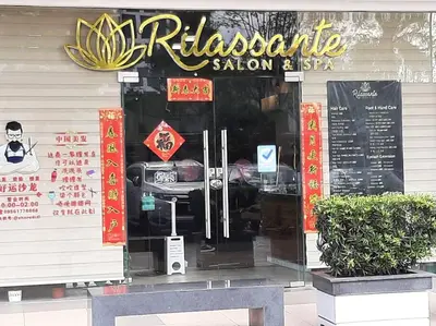a restaurant with a sign on the front of it at Cozy Shore Residence with balcony near Mall of Asia & airport in Manila