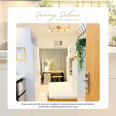 a small room with a bed and a desk at Sunny Solace a Homey Condo in Filinvest Alabang in Manila