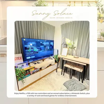 a catalogue of a living room with a tv and a desk at Sunny Solace a Homey Condo in Filinvest Alabang in Manila