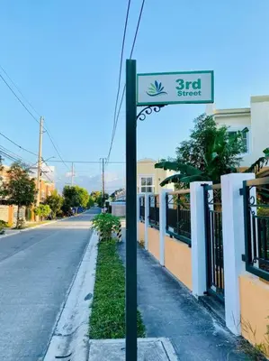 a street sign on the side of a road at La Prima - The Perfect Urban Oasis in Santa Rosa
