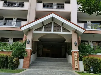 an entry to a building with a stairway at 2-bedroom with Balcony in a Resort Setting - H Ivory in Manila