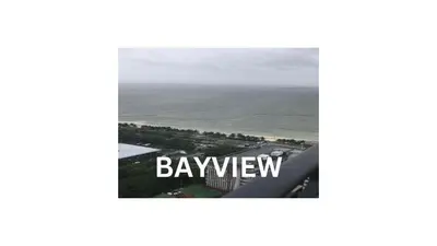 a view of the ocean from the top of a building at Cozy 1 Bedroom Apartment for Long Term Rentals in Manila