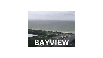 an aerial view of the ocean and a highway at Cozy 1 Bedroom Apartment for Long Term Rentals in Manila