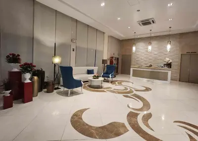 a lobby with a spiral carpet on the floor at 1 Bed Apartment - Sleeps 7 - Pool & Wifi in Manila