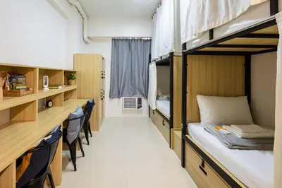 a small room with a bunk bed in it at The City Flats Circuit in Manila