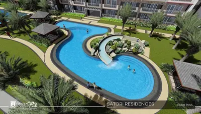 an overhead view of a swimming pool in a resort at Satori Residence in Manila