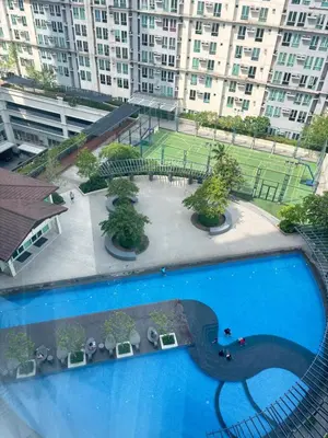 an overhead view of a swimming pool in a building at Hayahay Vacay in Manila