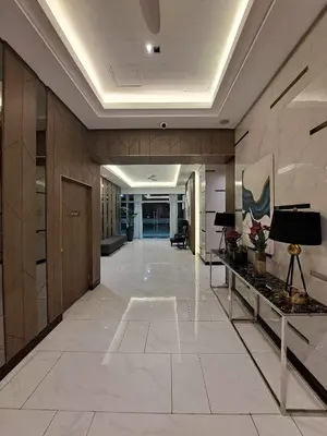 a hallway of a building with a desk at Apartment Condo Unit in Rizal in Manila