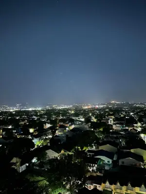 a view of a city at night at Apartment Condo Unit in Rizal in Manila
