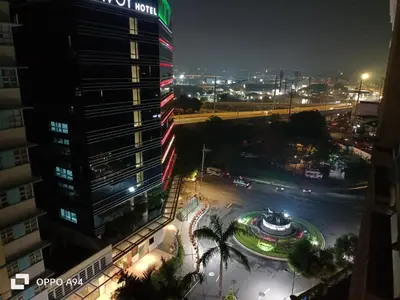 an aerial view of a city at night at Condotels near and across Terminal3 Airport in Manila