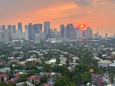 a cityscape of a city with a city skyline at 1BR Cozy Condo at Kasara Urban Resort Pasig City in Manila