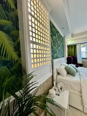 Gallery image of One Bedroom with Balcony by Christine Suites PH in Greenbelt Radisson in Manila