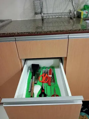 a drawer in a kitchen with tools in it at Newport 101 - East Wing in Manila
