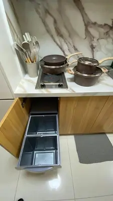 a counter with some pots and pans on a stove at Enchanted Gateway by Shore 3 in Manila