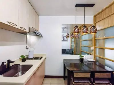 a kitchen with a sink and a counter top at 1BR Condotel Ridgewood Towers Taguig City #RW04 in Manila
