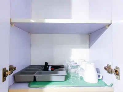 a kitchen counter with a sink and paper towels at 1BR Condotel Ridgewood Towers Taguig City #RW04 in Manila