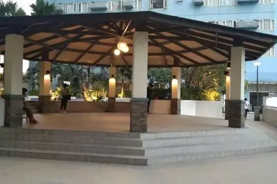 a gazebo with a person sitting in it at 1BR Condotel Ridgewood Towers Taguig City #RW05 in Manila