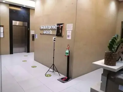 a elevator with a sign on a wall with a camera at 1BR Condotel Ridgewood Towers Taguig City #RW06 in Manila