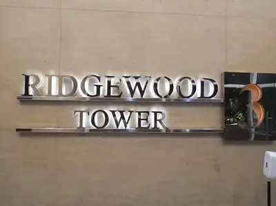 a sign for a rippwood topper on a wall at 1BR Condotel Ridgewood Towers Taguig City #RW11 in Manila