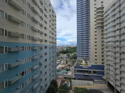 two tall buildings standing next to each other at 1BR Condotel Ridgewood Towers Taguig City #RW14 in Manila