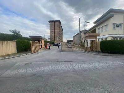 an empty street with buildings on the side of the road at Kral Suite in Las Piñas in Manila