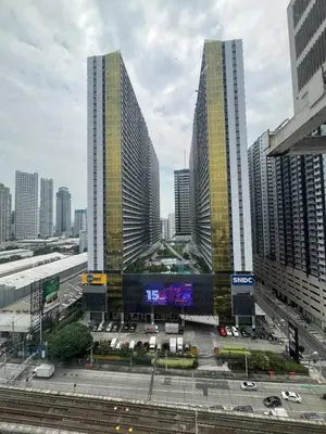 a view of a city with tall buildings at Fame Residences EDSA Shaw MRT Shangrila Megamall in Manila