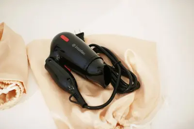 a pair of headphones sitting on a table at Luxury Oasis in Makati with Balcony in Manila