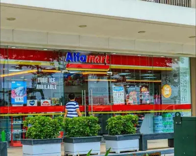a man standing in front of a store at Oranje Suite near NAIA AIRPORT in Manila