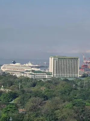 a large building in the middle of a city at Torre de Manila Unit 1720 Taft Avenue Manila Unit 1720 in Manila