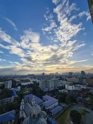 a view of a city with a cloudy sky at Torre de Manila Unit 1720 Taft Avenue Manila Unit 1720 in Manila
