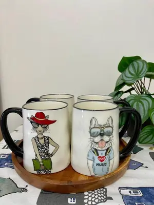 three coffee mugs sitting on a wooden tray at Serene Condo Unit in Front of US Embassy in Manila