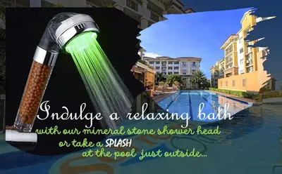 a bottle of beer with aorting bath with our mineral stone shower head at 2BR Italian-inspired Condo Unit, Balcony Pool View in Manila