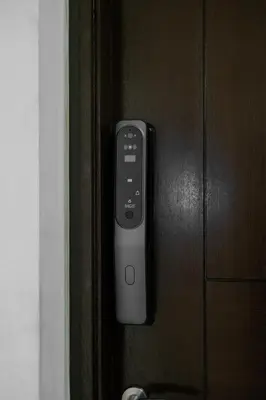 a remote control is hanging on a door at Eastwood City Cozy Designer Studio Long Stay Friendly Walk to Mall in Manila