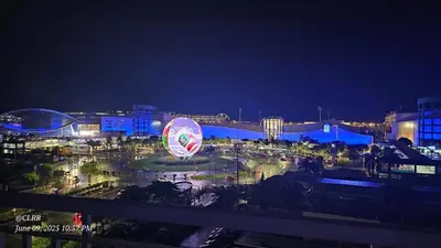 a city at night with a hot air balloon at 1 Bedroom Condo Unit Near MOA with Netflix and WIFI in Manila