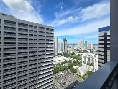 a view of a city skyline from a building at 1BR Condotel with Balcony at FAME Residences #FM46 in Manila