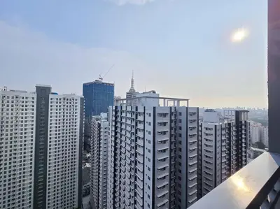 a view of a city skyline with tall buildings at 1BR Condotel with Balcony at FAME Residences #FM48 in Manila