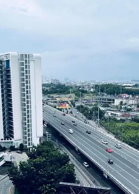 an overhead view of a highway with cars on it at Budget Suite Paranaque in Manila