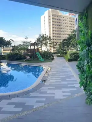 a playground with a slide and a playground at The Skyline Oasis Makati in Manila