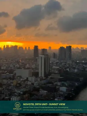 a city skyline with a sunset in the background at Novotel Twin Bed at Mandaluyong Near Makati FREE pool in Manila