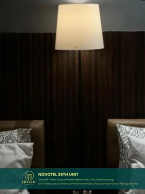 a lamp in a hotel room with two beds at Novotel Twin Bed at Mandaluyong Near Makati FREE pool in Manila