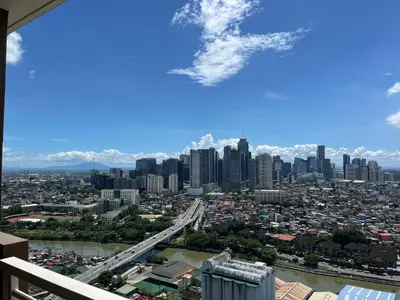 a view of a city from the top of a building at West Bricks in Manila