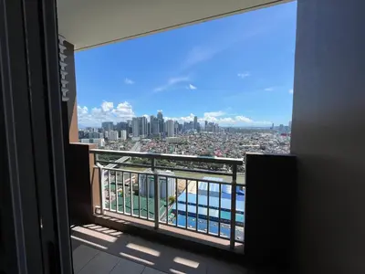 a view of a city from a balcony at West Bricks in Manila