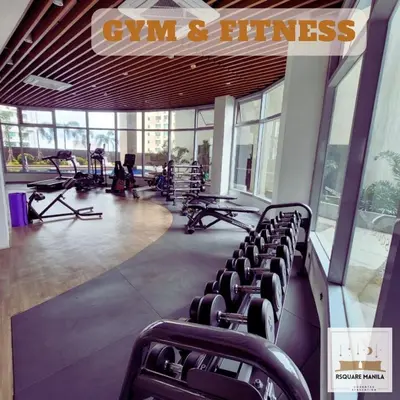 a gym with a bunch of chairs and machines at Nordic Rsquare Manila - with Pool Access in Manila