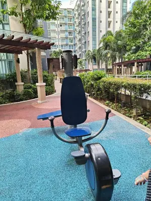 an office chair sitting on a blue carpet at Two Palmtree Villas cluster3 rooms across NAIA terminal 3 in Manila