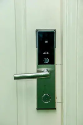 a door with a cell phone sticking out of it at Azure Urban Resort Staycation 1 Bedroom Beach View, 18th floor in Manila